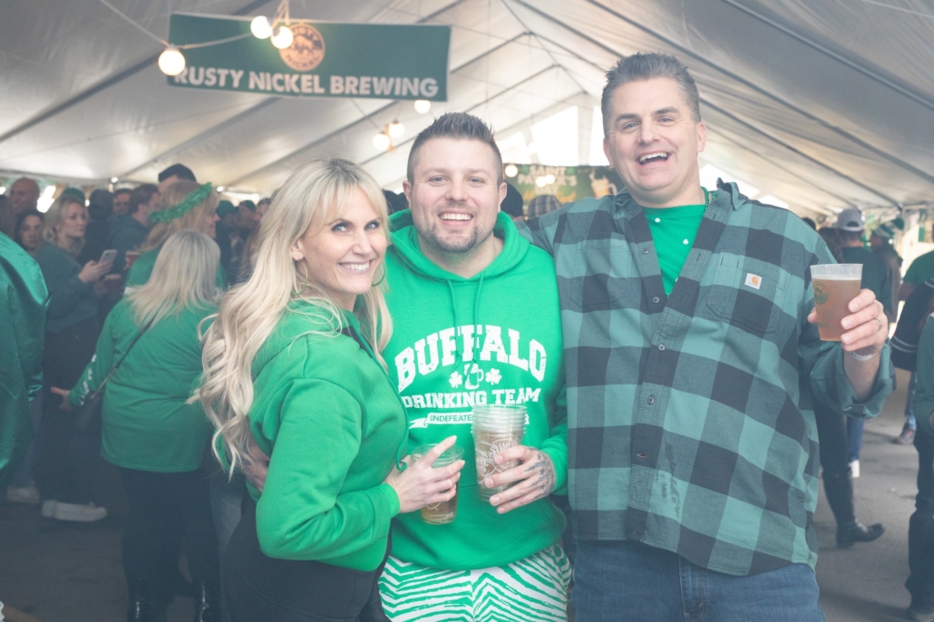 People celebrating in green attire.