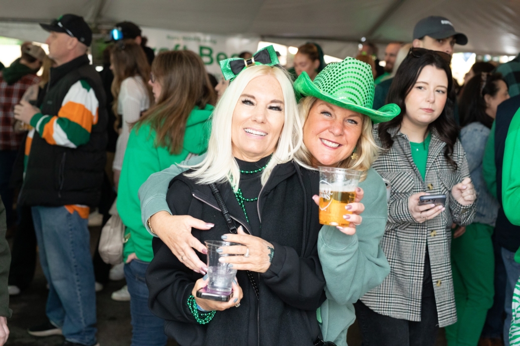 People celebrating in green attire.